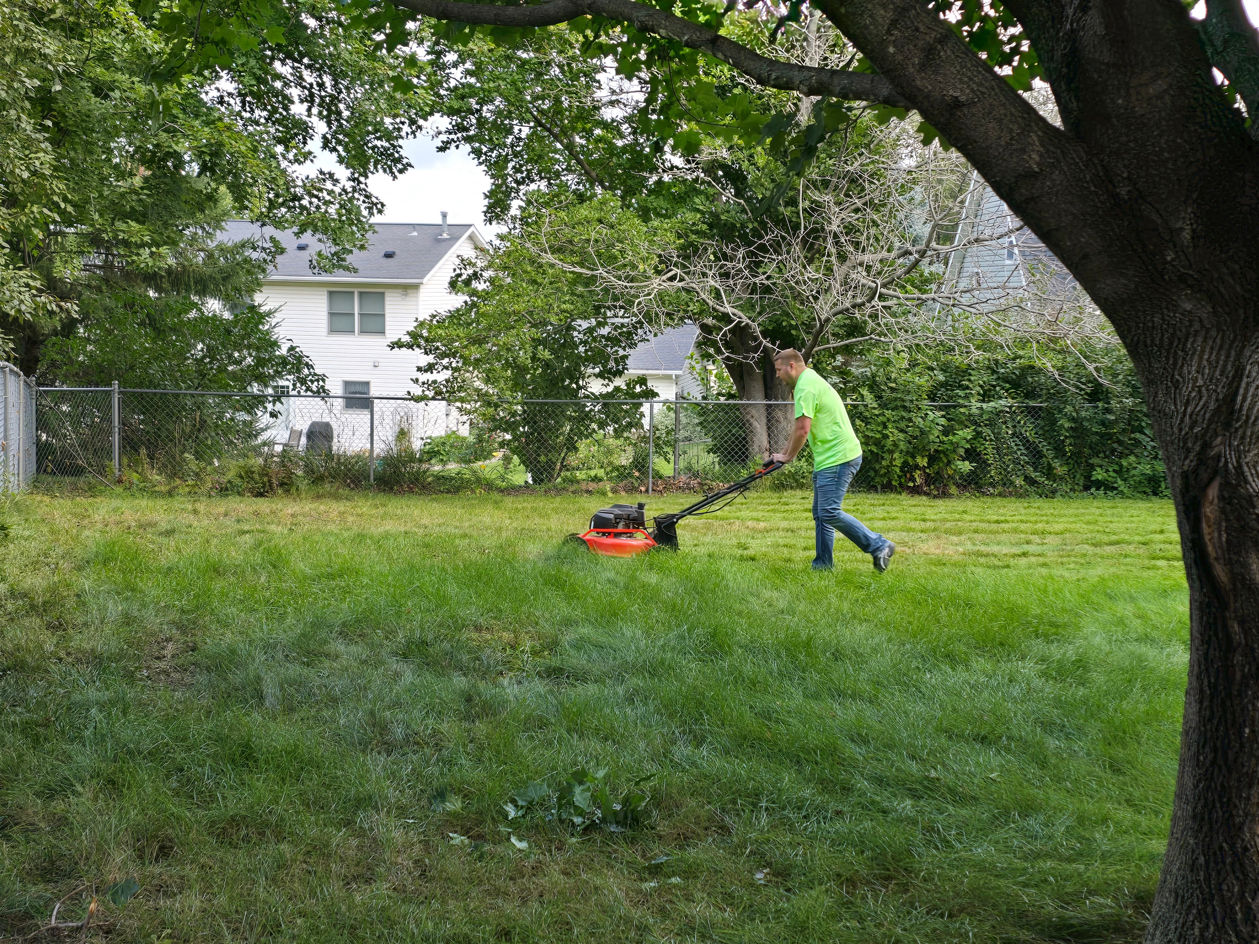 Jim Mowing Lawn