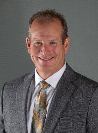 A person in a suit smiling
AI-generated content may be incorrect.