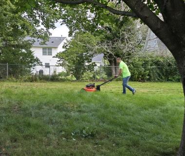 Jim Mowing Lawn